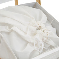 Estanterí­a con cesto de bambú natural blanca de 140x33x34 cm