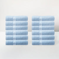 Juego de 12 toallas de lavabo color azul de 100x50 cm de 550gr/m²