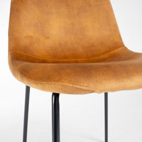 Silla Gina de terciopelo ocre con patas de metal negro