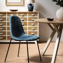 Silla Gina de terciopelo azul con patas de metal negro