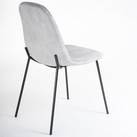Silla Gina de terciopelo gris con patas de metal negro