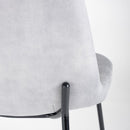 Silla Gina de terciopelo gris con patas de metal negro