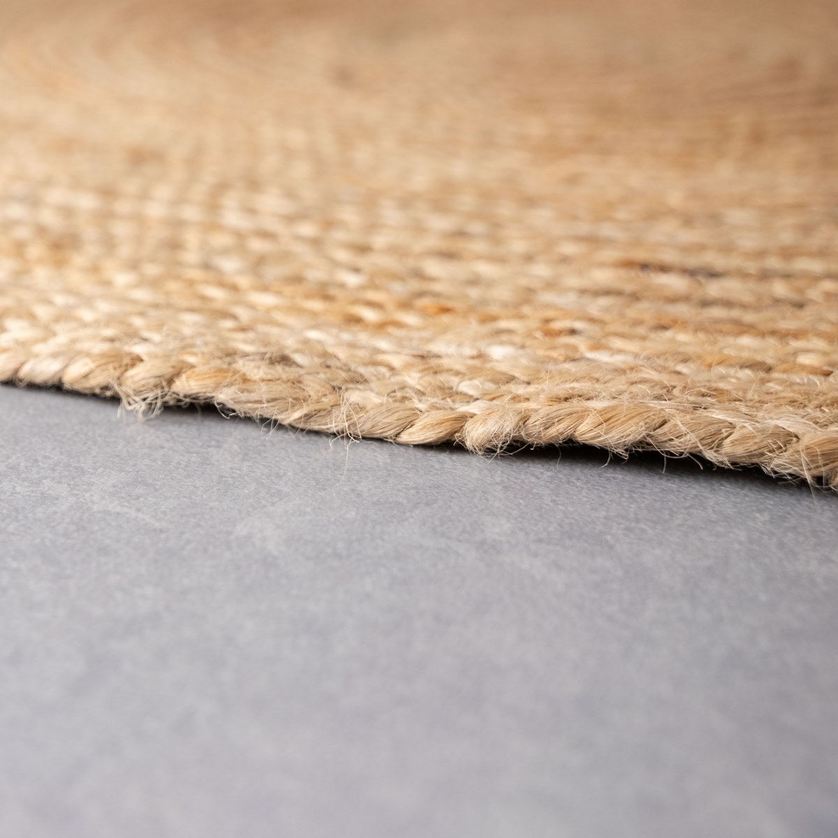 Alfombra redonda trenzada de yute natural doble costura de 90 cm