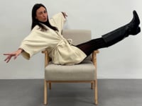 Sillón giratorio regulable en altura tapizado borreguito blanco